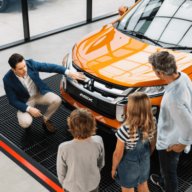 Mitsubishi salesperson helping customer